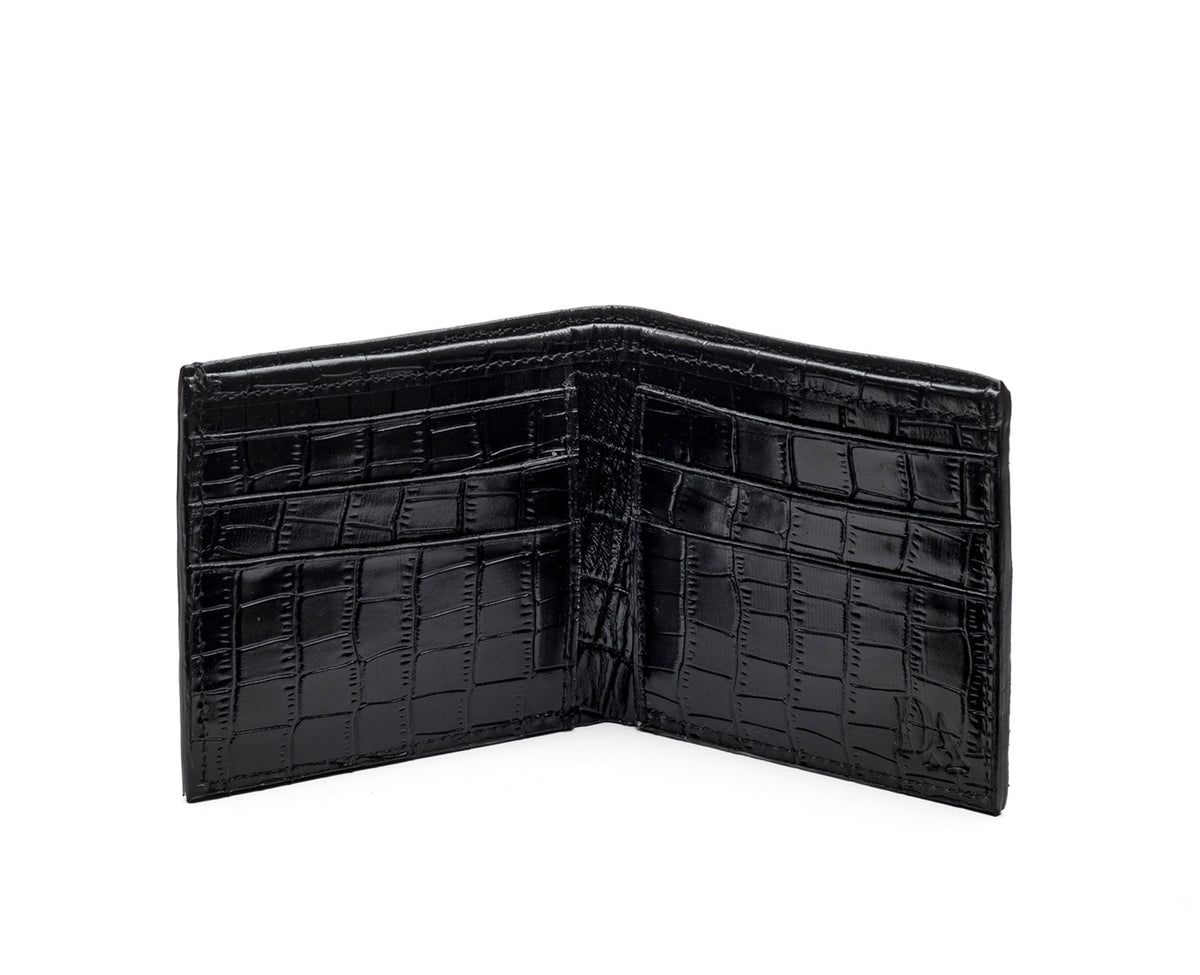 A black bifold wallet with a glossy crocodile-embossed texture