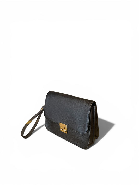 A black textured detail africa leather man purse with a gold-tone turn-lock clasp and a matching leather wrist strap