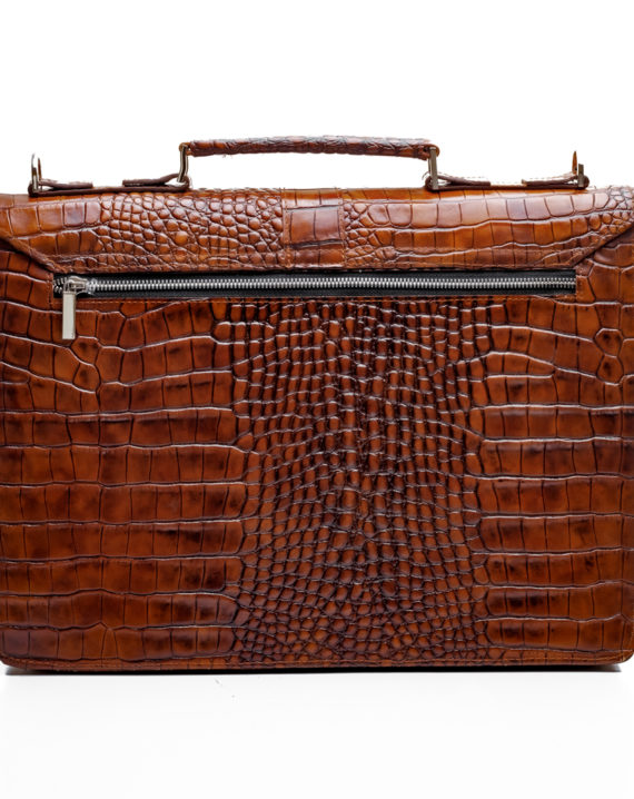 The Handcrafted Naju Leather Briefcase is the perfect briefcase for the contemporary working-class man with sharp and defined edges. It features double internal compartments that can fit a 13″-15″ laptop, back zip, and detachable strap. It fits different office items like a notebook or notepad, office files documents, ATM cards, ID Cards, and business cards. The briefcase has internal compartments to fit in a pen and smaller items also. It’s 100% genuine leather, has double internal compartments, back-zip, detachable and adjustable strap. It combines features of style and functionality while creating the perfect statement piece for the business or working-class man or woman. Our Black Naju Leather Briefcase is your go-to partner for working-class men, businessmen, and professionals. It is a “MUST get” item for those who want to steal the show at any event. this briefcase or use it as a gift item for your clients and loved ones. It is also be used for corporate and individual gift packages. For custom quotes, send us a mail at info@detailafrica.com with your requests and we would definitely get back to you.